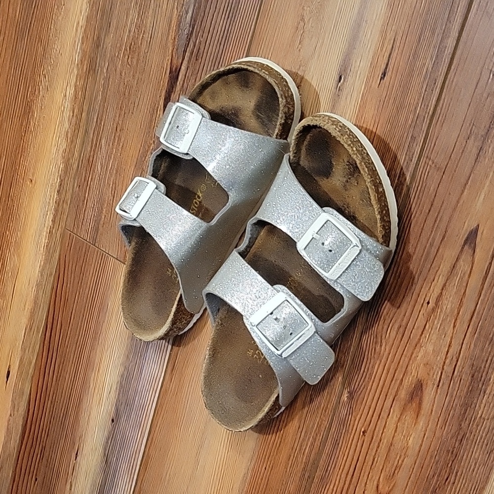 Kids Size 34 silver Birkenstocks.